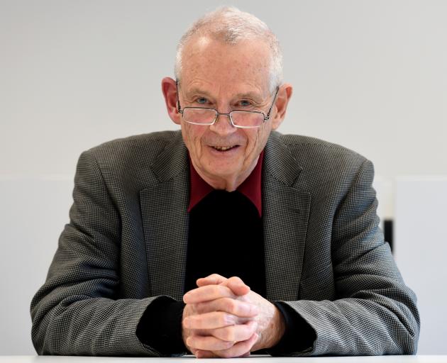 Walter Grills sits at the head of the mediation table one last time. PHOTO: GREGOR RICHARDSON