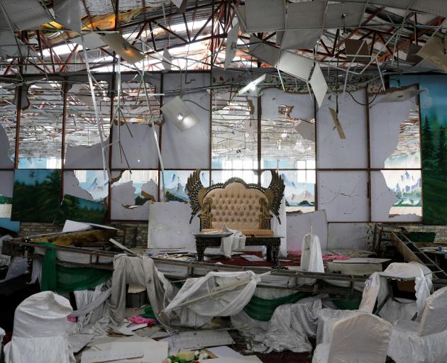 A damaged stage of a wedding hall is seen after a blast in Kabul, Afghanistan. Photo: Reuters 