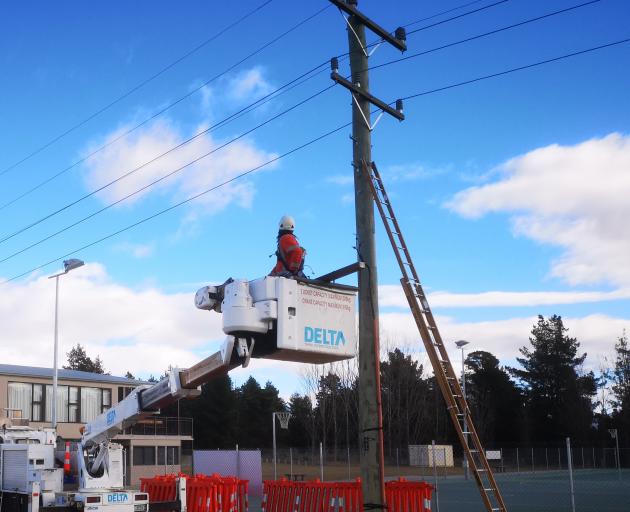 A new power pole is put up outside Alexandra's netball courts on Tuesday morning. Photo: Supplied