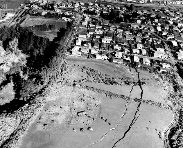 An aerial photograph (top) shows the giant cracks running through Abbotsford the day before the...