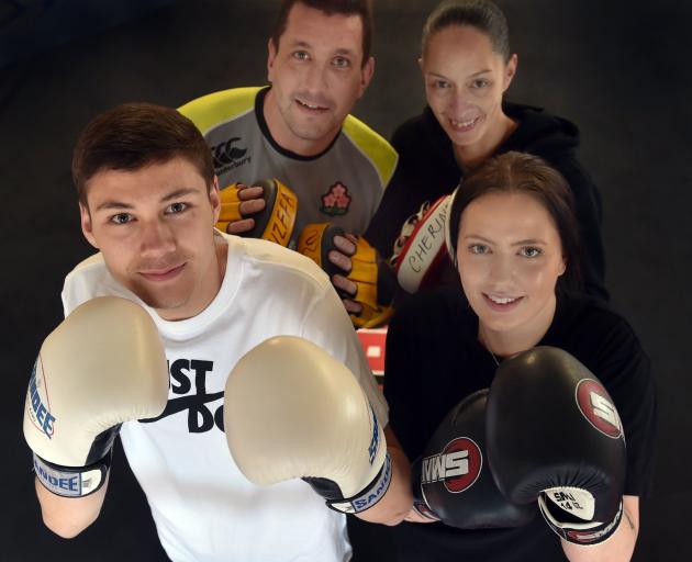 The Henry family sure packs a punch. Zsana (front right) and her brother Awatea (front left) will fight in the Canterbury Championships this weekend. Dad Ryan (back left) and mum Cherine are former South Island Golden Glove winners. Photo: Peter McIntosh