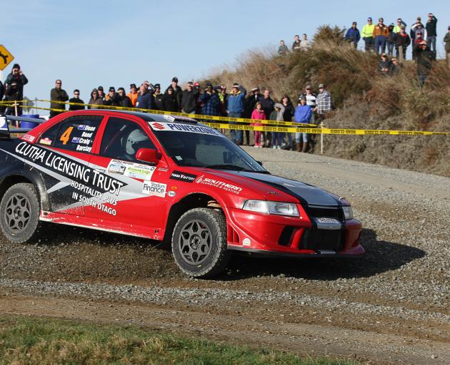 Dean Bond, of Balclutha, slides his Mitsubishi Evo 6.5 through the Romahapa corner during the...