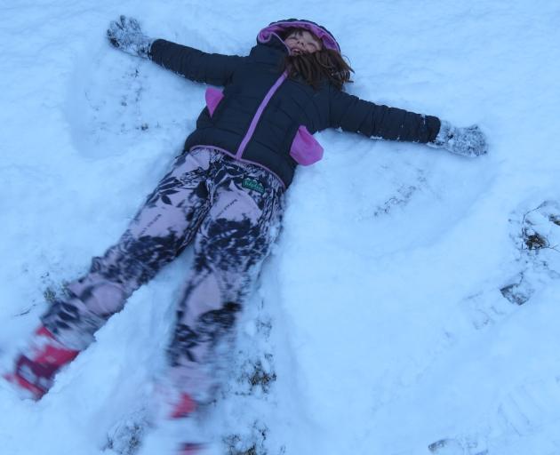 Isobel Rix (8), of Ettrick, was delighted when she woke up to snow as she and her family have...