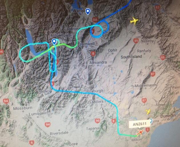 A flight tracker shows the route the plane took before landing in Dunedin. 