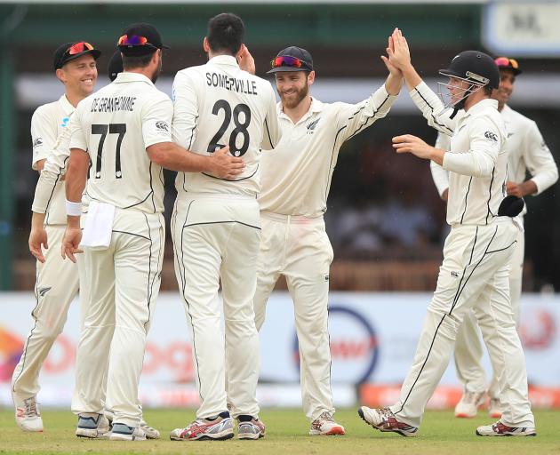 The Black Caps celebrate the wicket of Lahiru Thirimanne. Photo: Getty Images 