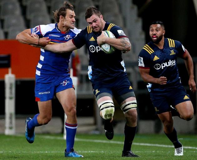 Liam Squire on the run for the Highlanders against the Stormers this year. Photo: Getty Images