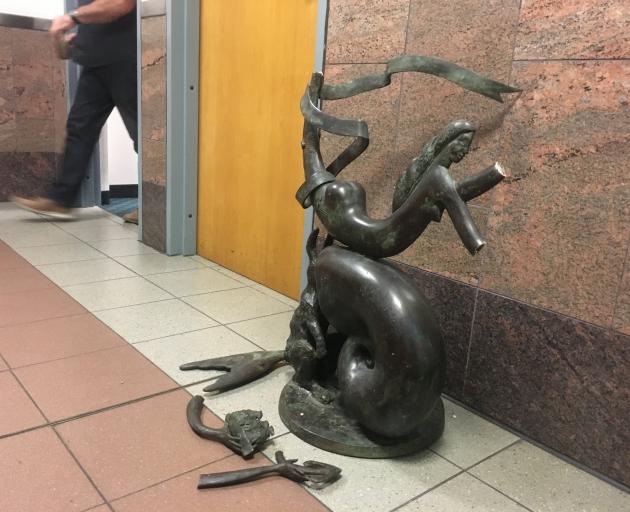 The mermaid sculpture was left in pieces after the incident. Photo: George Block
