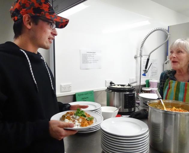 Darion Ehingi lines up for the vegetarian, vegan, gluten-free option, a vegetable and lentil...