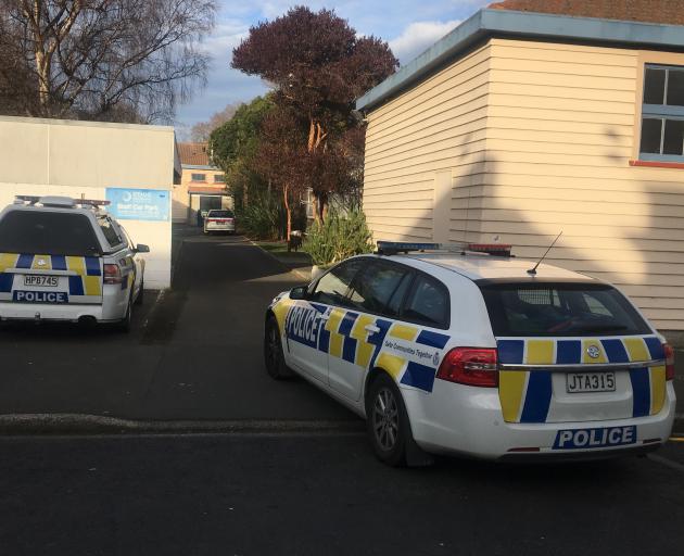 Police outside the Dunedin School of Art. Photo: George Block