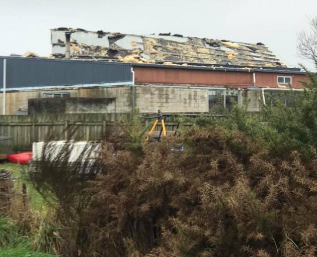 Part of the roof of the Riverton swimming pool has lifted off in strong winds this afternoon. Photo: Facebook