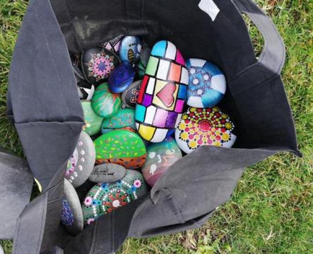 painted rocks were found in Rolleston's Parekura Reserve as part of an initiative to bring the community together.