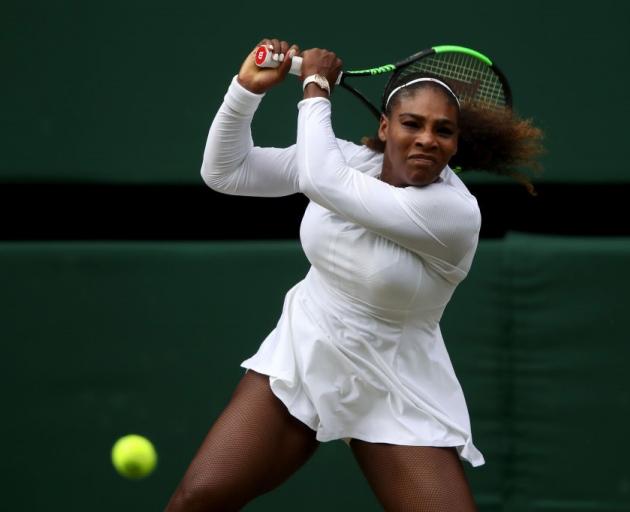 Serena Williams plays a backhand during her quarterfinal win at Wimbledon. Photo: Getty Images