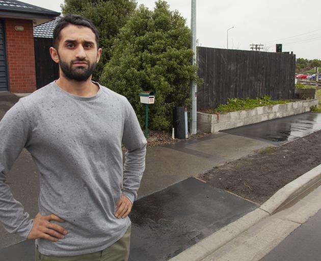 Sirwan Khalandi outside his Scruttons Rd house which he says has been damaged by roadworks. Photo: Geoff Sloan
