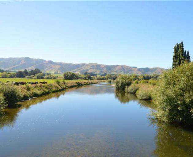 The Pomahaka River looking downstream from a bridge on State Highway 90 between Tapanui and...
