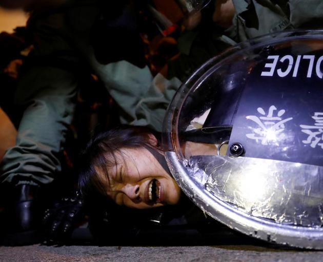 Hong Kong Police clash with protesters in the city. Photo: Reuters