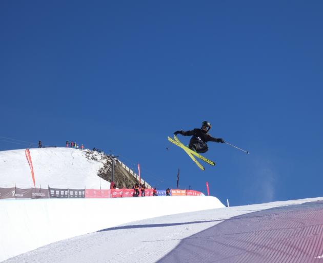 American freeskier Birk Irving ramps the halfpipe on the way to victory during the Winter Games...