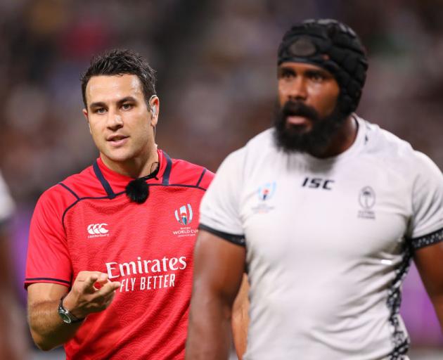 Referee Ben O'Keeffe talks with players during the Rugby World Cup. Photo: Getty Images