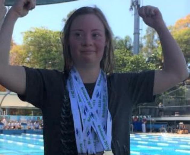 Charlotte Rozen won four medals at the Australian Down Syndrome swimming championships