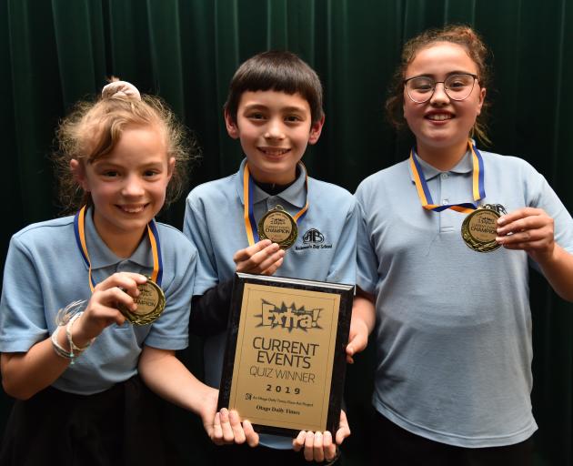 Winners of the years 5-6 Extra! current events quiz at Bathgate School last night are Isla Kamo (10), Adrian Blakie (11) and Aria McFelin, of Anderson's Bay School. Photos: Gregor Richardson