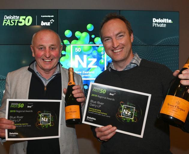 Blue River Dairy operations manager Rod Bott (left) and marketing manager Gareth Lyness with their Deloitte Fast 50 awards at the awards function at Toitu Otago Settlers Museum in Dunedin last night. Photo: Linda Robertson