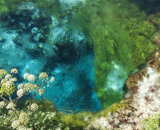 The beautiful turquoise waters of the Syri i Kalter (Blue Eye) spring in Saranda.

