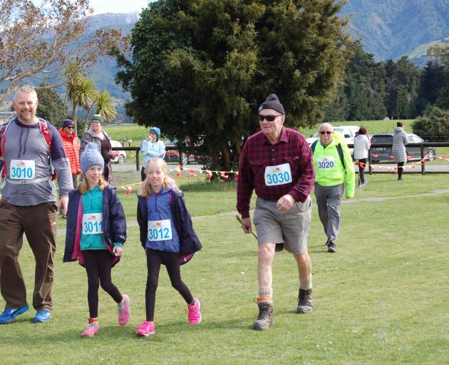 Entrants in Kaikoura Suburban School’s Whale Run included Richard South, left, Cameron South, Holly South and Alastair Campbell completing the 10km walk. Alastair was the oldest competitor, at 84. Photo: Supplied