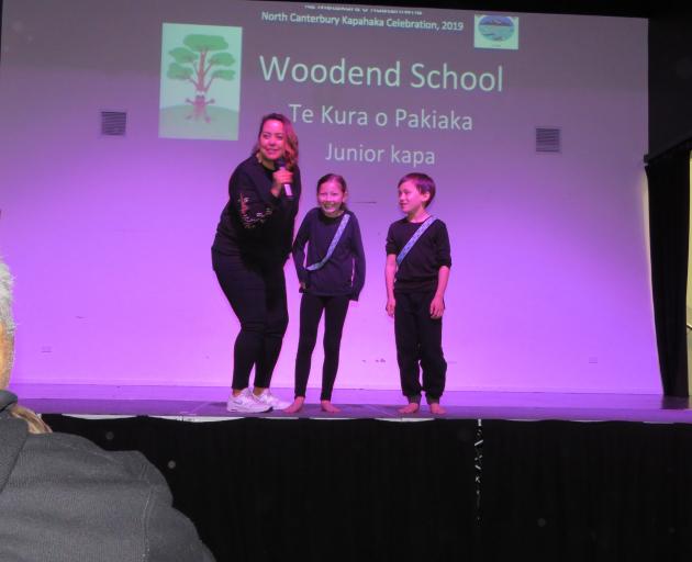MC and Tuahiwi School principal Melanie Taite-Pitama, left, chats to two performers from Woodend...