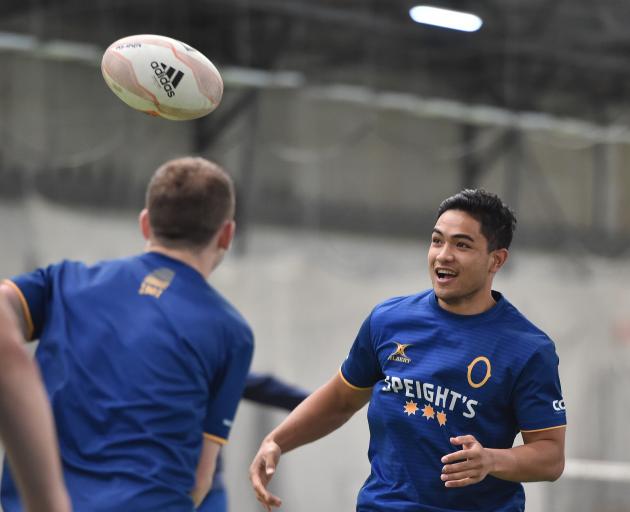 Otago and All Black first five-eighth Josh Ioane looks to get involved in a game at training at the Edgar Centre yesterday. Photo: Gregor Richardson