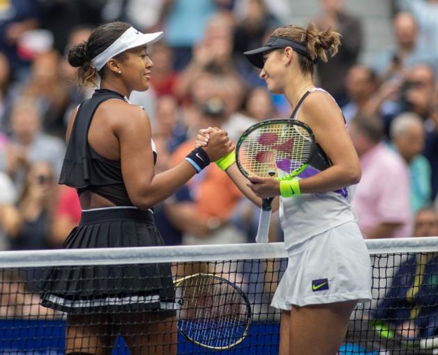 Naomi Osaka (left) and Belinda Bencic shake hands after their match this morning at the US Open....