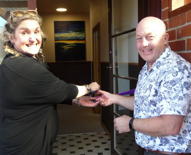 Gore and Clutha Women’s Refuge manager Sam Munro and Clutha Mayor Bryan Cadogan open the refuge’s new transitional house in Balclutha on Tuesday. Photo: Richard Davison
