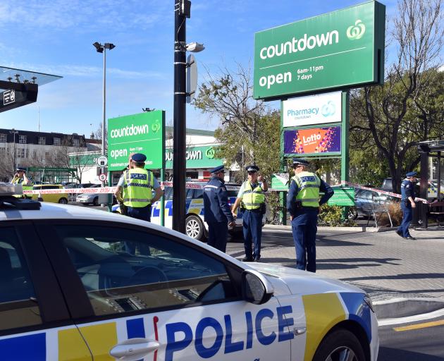 Some of the police who evacuated the Dunedin Central Countdown car park yesterday. PHOTOS: PETER...