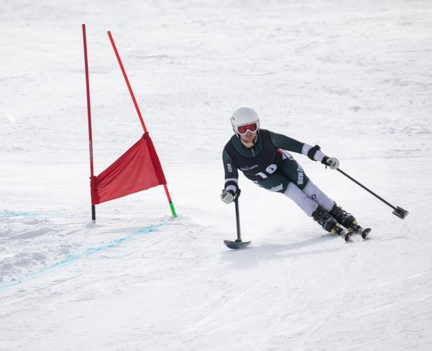 Wanaka’s Adam Hall tears down the slope on his way to winning the giant slalom at the World Para Alpine Skiing Southern Hemisphere Cup at Cardrona yesterday. Photo: Neil Kerr