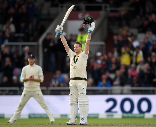 Steve Smith celebrates reaching a double century for Australia against England. Photo: Getty Images