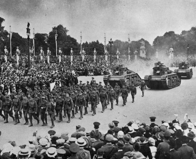 The Tank Corps march during the Victory celebrations on Peace Day in London. - Otago Witness, 30.9.1919.