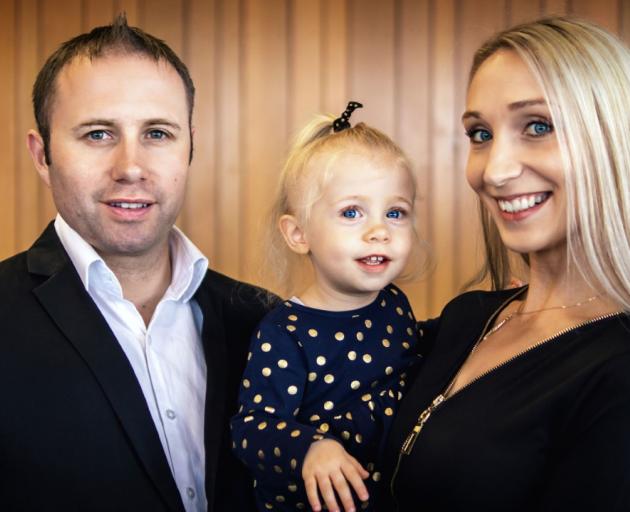 City councillor Yani Johanson with his 4-year-old daughter Milania and wife Katya.