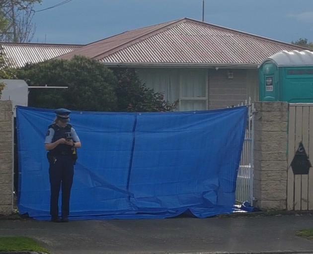 Police at the scene at the elderly couple's Burnside home. Photo: StarNews