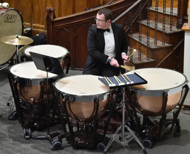 Richard Gayfer plays St Kilda Brass' new timpani drums for the first time. The drums cost $30,000...
