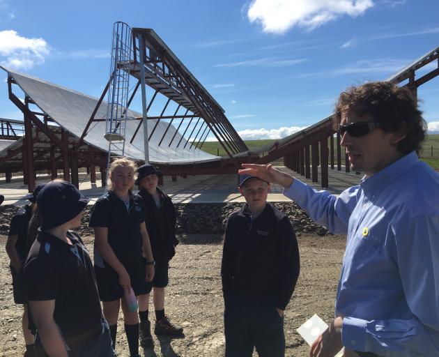 LeoLabs co-founder and chief technical officer Michael Nicolls talks to Maniototo school pupils at the opening of LeoLabs' Kiwi Space Radar in Naseby yesterday. Photo: Pam Jones