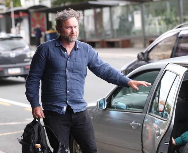 Angus Allan arrives at the Waitakere District Court today for his sentencing. Photo: NZ Herald