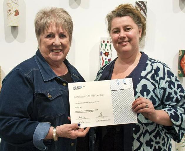 Departing gallery stalwart Anne Carr with art gallery committee vice-president Fleur Tompsett.

