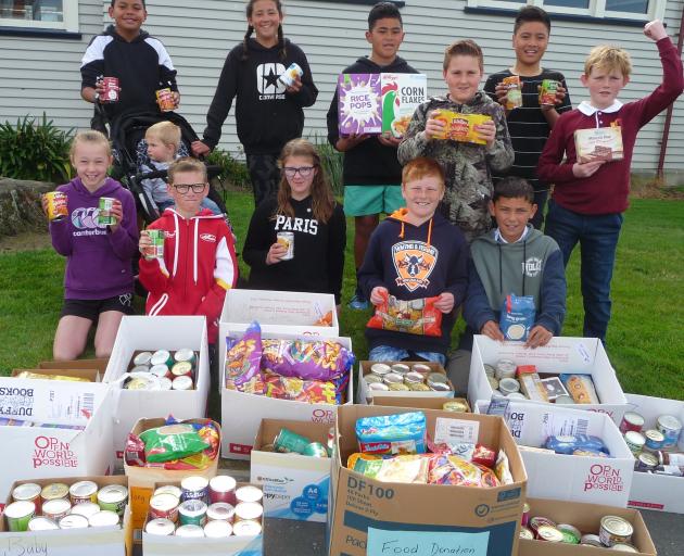 Hampstead School's Young Vinnies with some of the donated perishable goods, back row, Isope Maile...