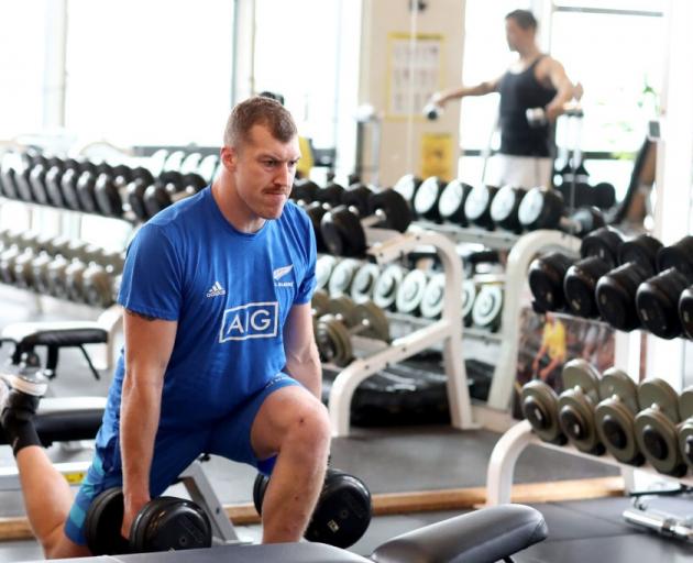 Brodie Retallick trains in the gym ahead of the All Blacks semifinal clash with England. Photo:...