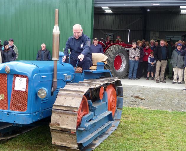 Rangitata MP Andrew Falloon tries out a Fordson Major tractor similar to one his grandfather used when he farmed at Waimate, during the official opening of the Mid Canterbury Vintage Machinery Club. Photos: Mick Jensen