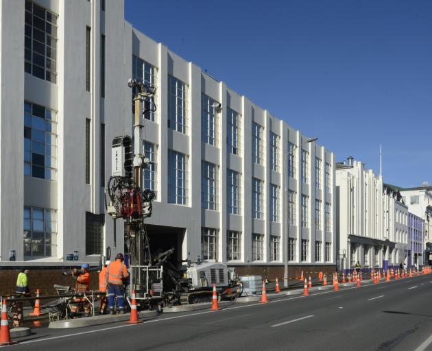 A drilling rig operates in Cumberland St outside the former Cadbury factory in August, as engineers conducted ground assessments for the new Dunedin Hospital. Photo: Gerard O'Brien
