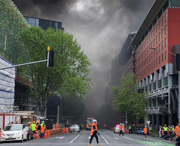 Smoke can be seen billowing in the air. Photo: RNZ