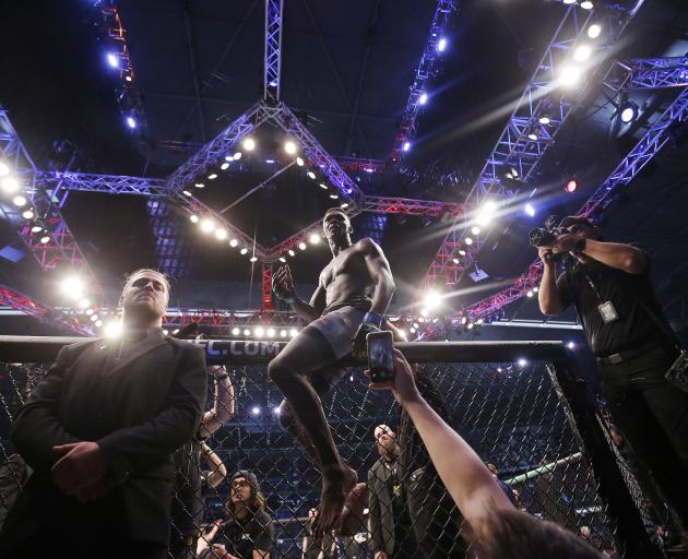 Israel Adesanya celebrates his knockout victory in Melbourne. Photo: Getty Images 