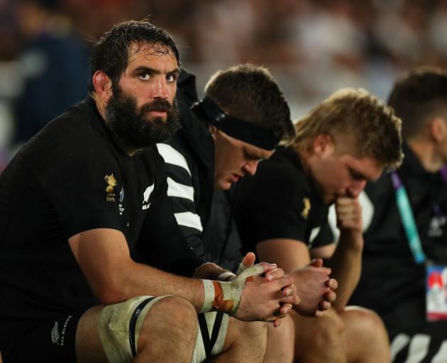 Sam Whitelock, Scott Barrett and Jack Goodhue look downcast in the dying moments. Photo: Getty...