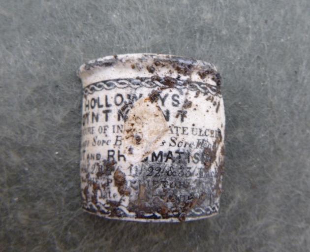 A Holloway’s ointment container, which could be from the 1860s.