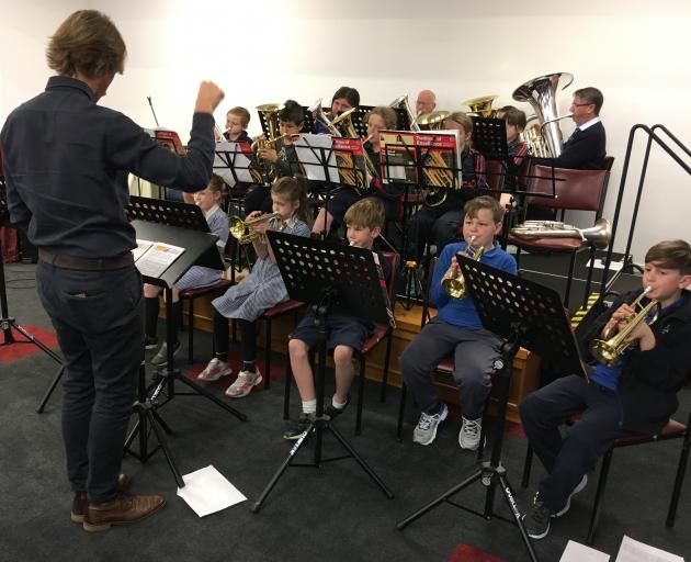 Conductor Barrett Hocking leads a rehearsal for last week's concert for the Just Brass music programme run by the Rangiora Salvation Army. Photos: David Hill