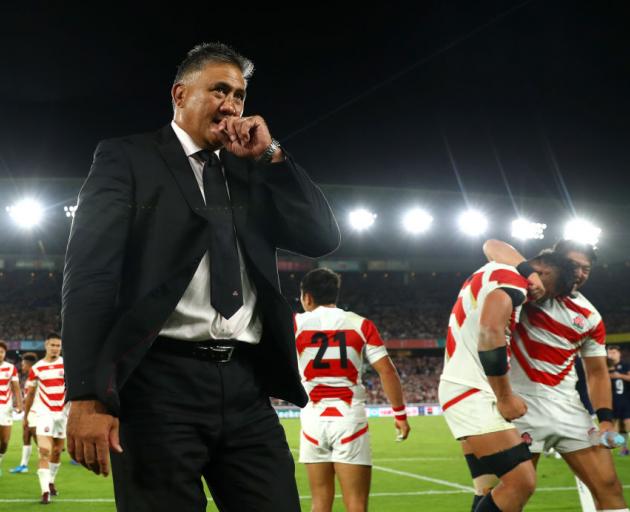 Head Coach of Japan Jamie Joseph celebrates victory after the Rugby World Cup 2019 game between...